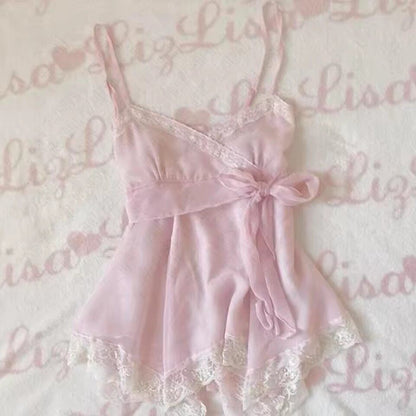 Pink slip babydoll dress with bow front and lace-trim ruffled hem, spaghetti straps