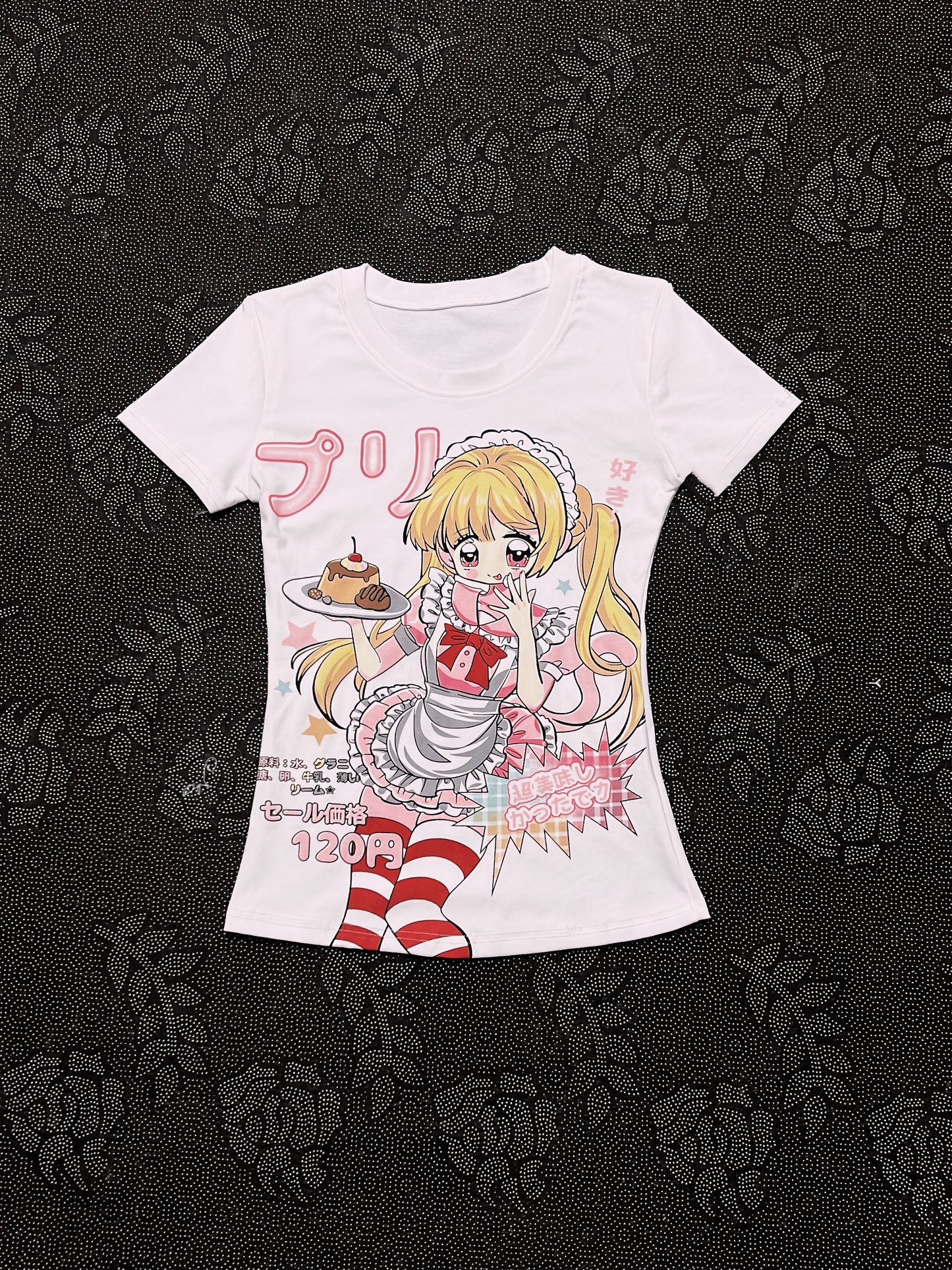 White graphic T-shirt with cartoon anime girl holding a dessert plate