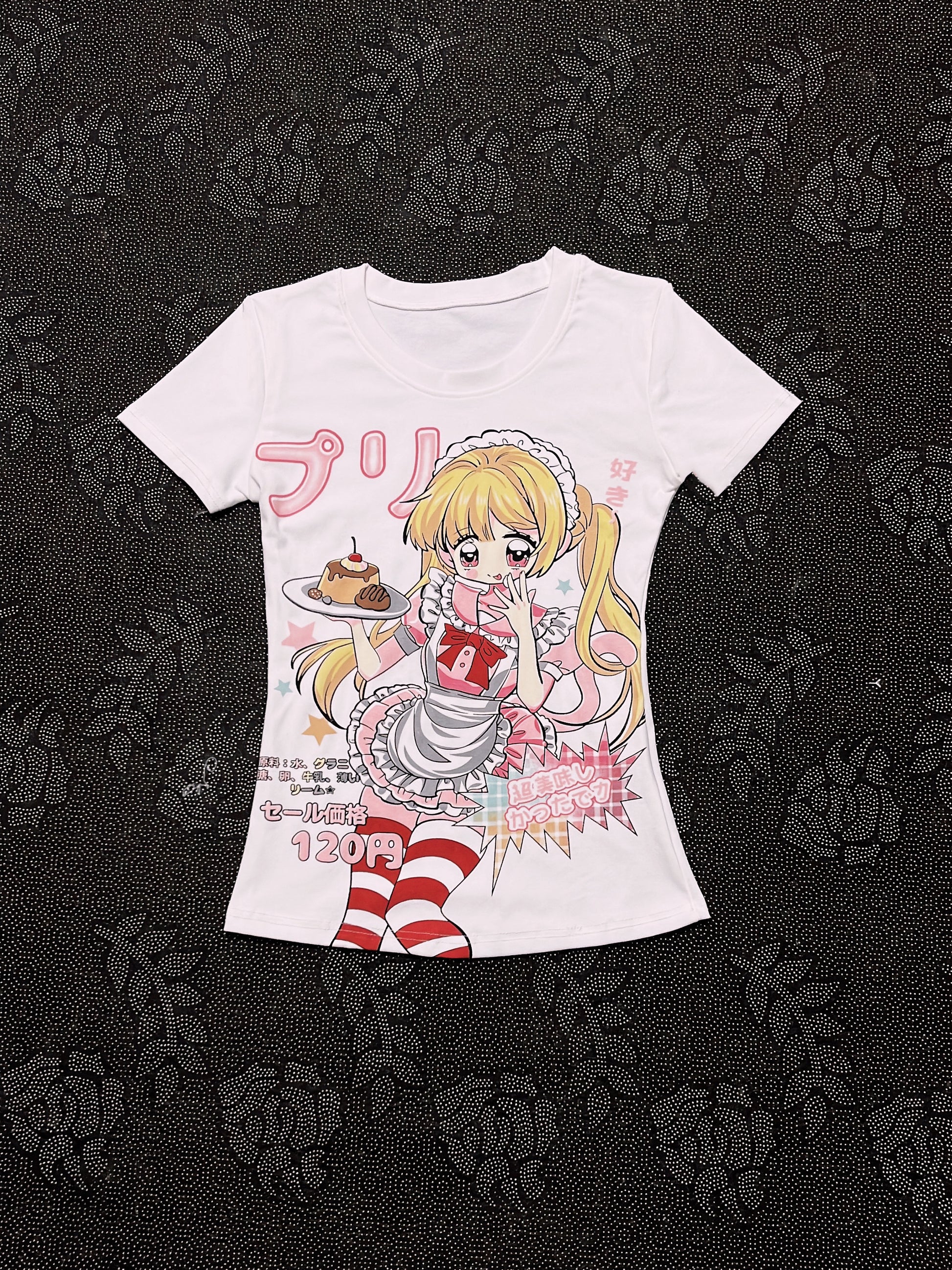 White graphic T-shirt with cartoon anime girl holding a dessert plate