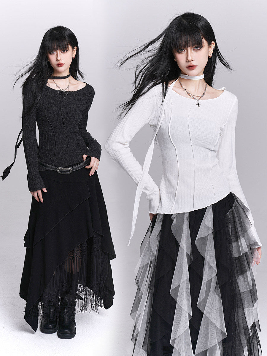 Black slim long-sleeve fitted inner top with round neckline and vertical seam details