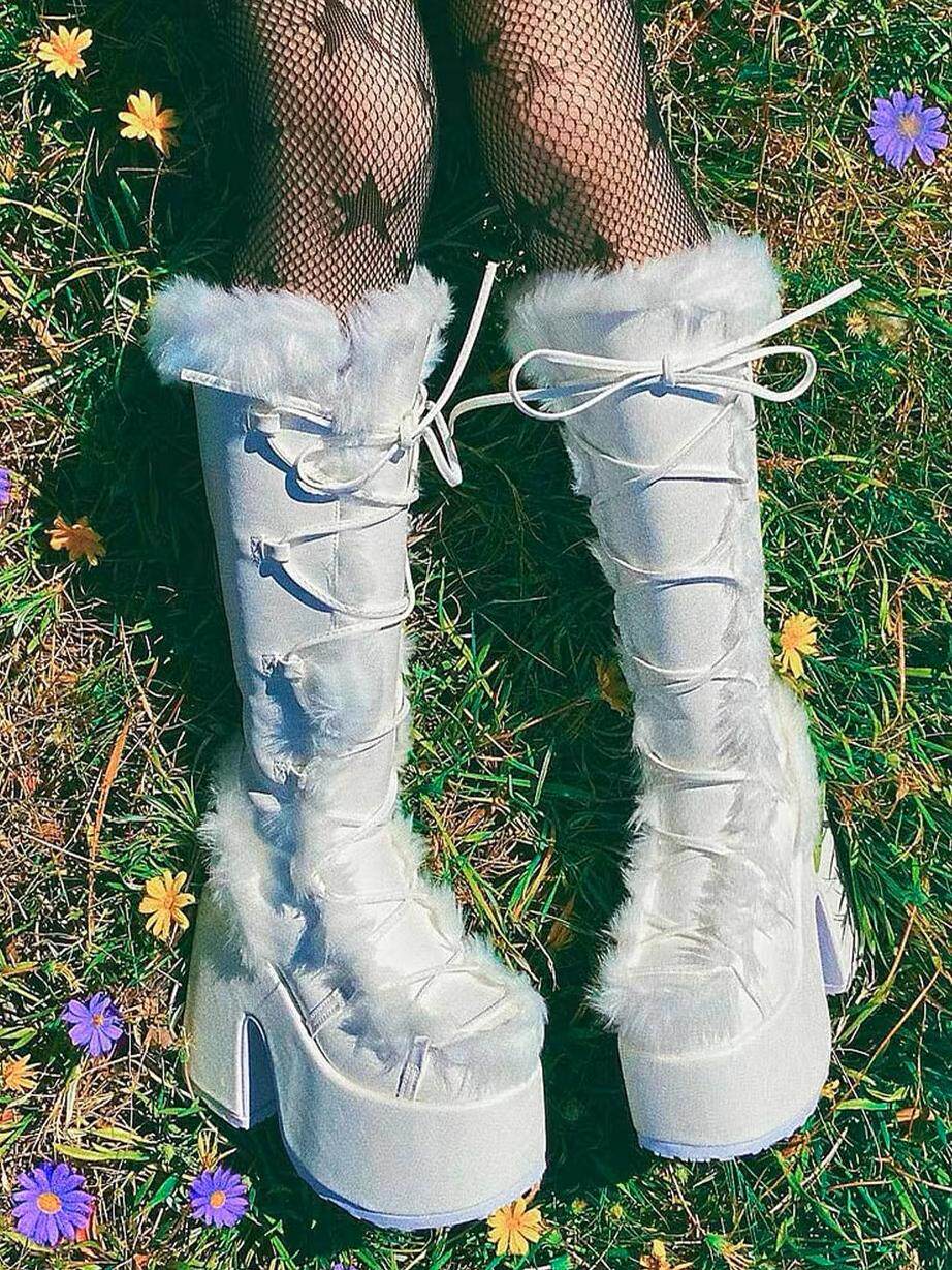 Light blue platform ankle boots with lace-up front and fluffy faux-fur trim
