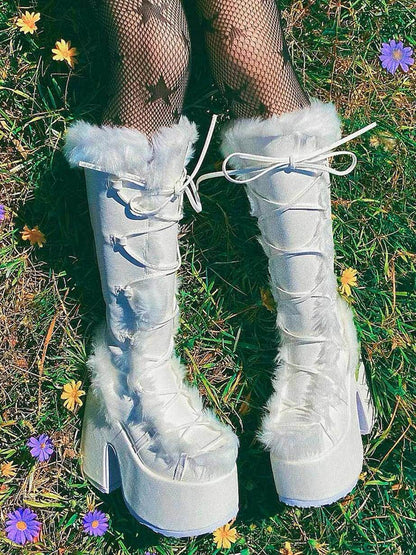 Light blue platform ankle boots with lace-up front and fluffy faux-fur trim