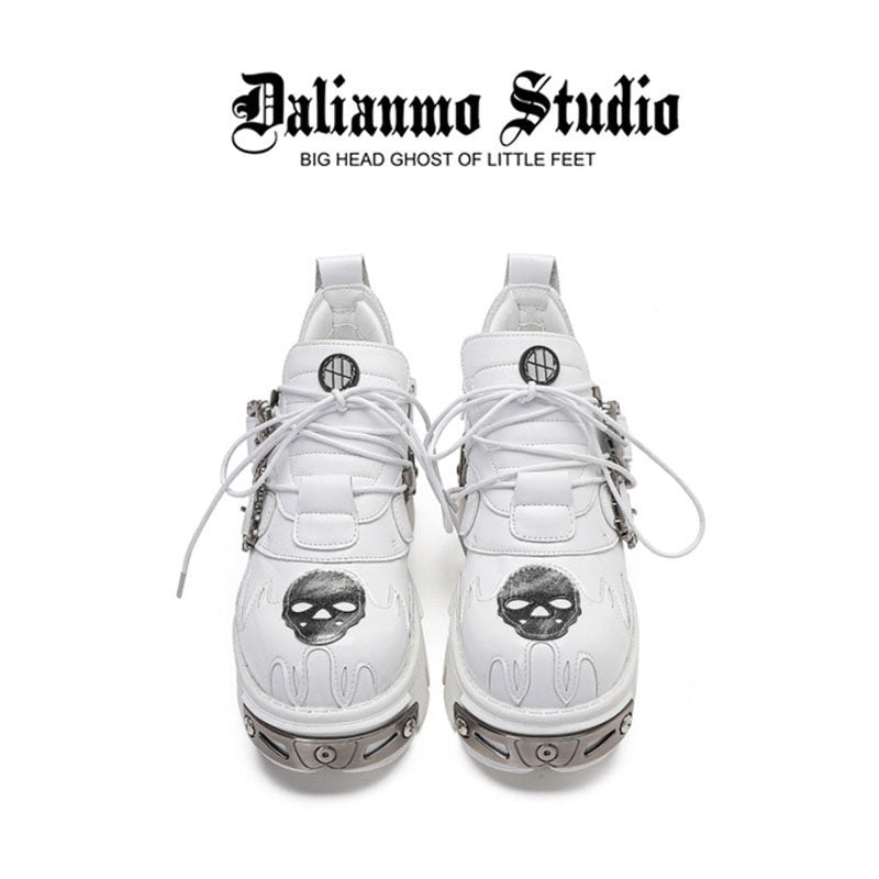 White lace-up platform shoes, front view, with embossed pattern and silver details