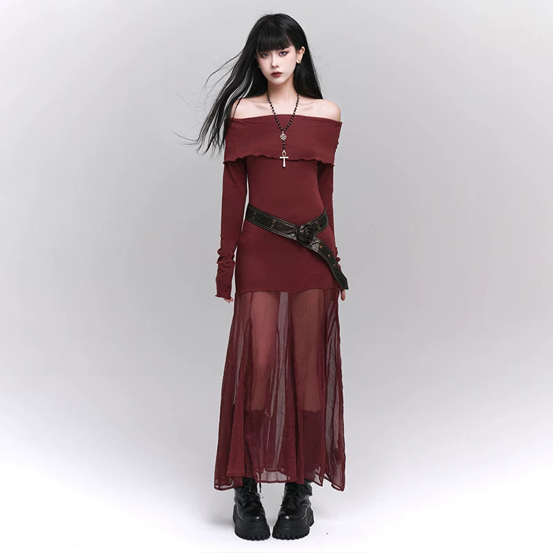Leather belt with decorative buckle and long strap detail, worn at waist