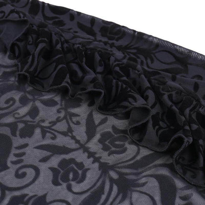 Black damask fabric panel with raised swirl pattern
