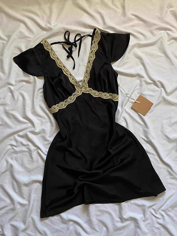 Black lace V-neck mini dress with puff sleeves, scalloped lace trim, flared skirt.