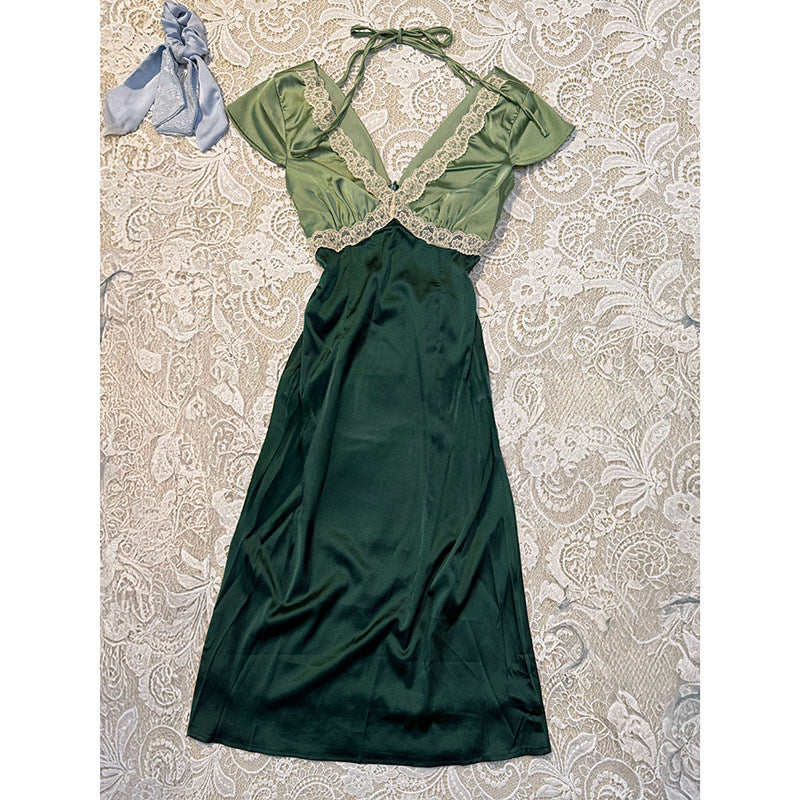 Two-tone green satin V-neck dress with lace trim, cap sleeves, and tie bow