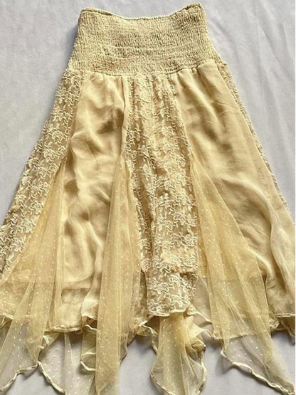 Yellow layered fairy-style skirt with lace patchwork, elastic waist, and uneven hem