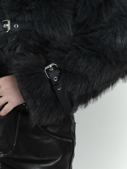 Black faux fur jacket detail with metal buckle strap and snap buttons
