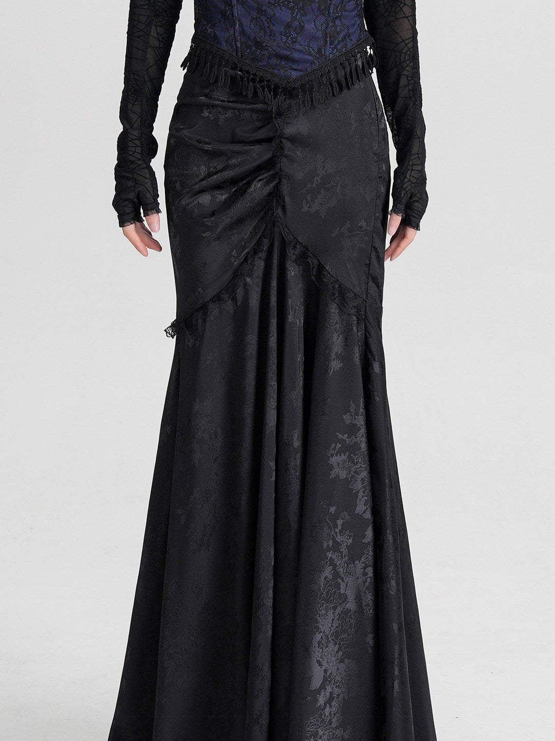 Black jacquard midi skirt with corset-style front tie bow and draped panels
