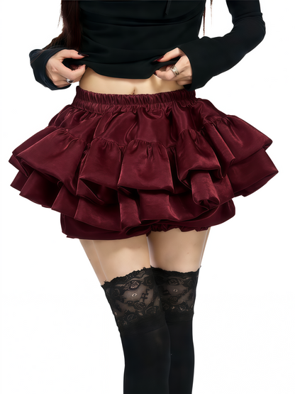 Burgundy tiered ruffle skirt with gathered elastic waistband and layered fabric