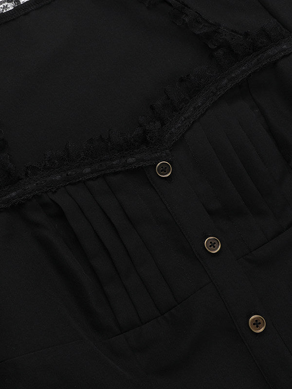 Black blouse close-up: lace trim, button placket with gold-tone buttons