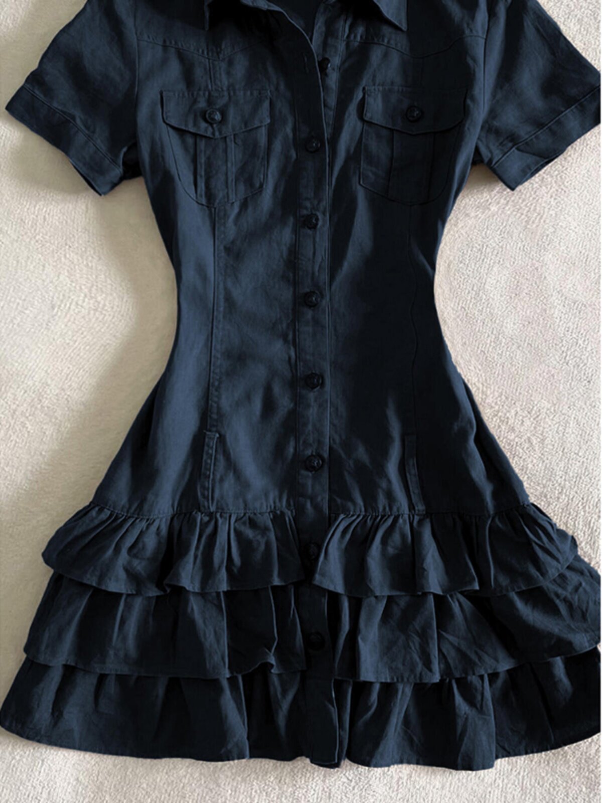 Dark blue button-front shirt dress bodice with chest pockets and short sleeves