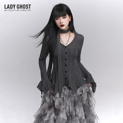 Black long-sleeve knit cardigan with button front and ruffled layered tulle hem