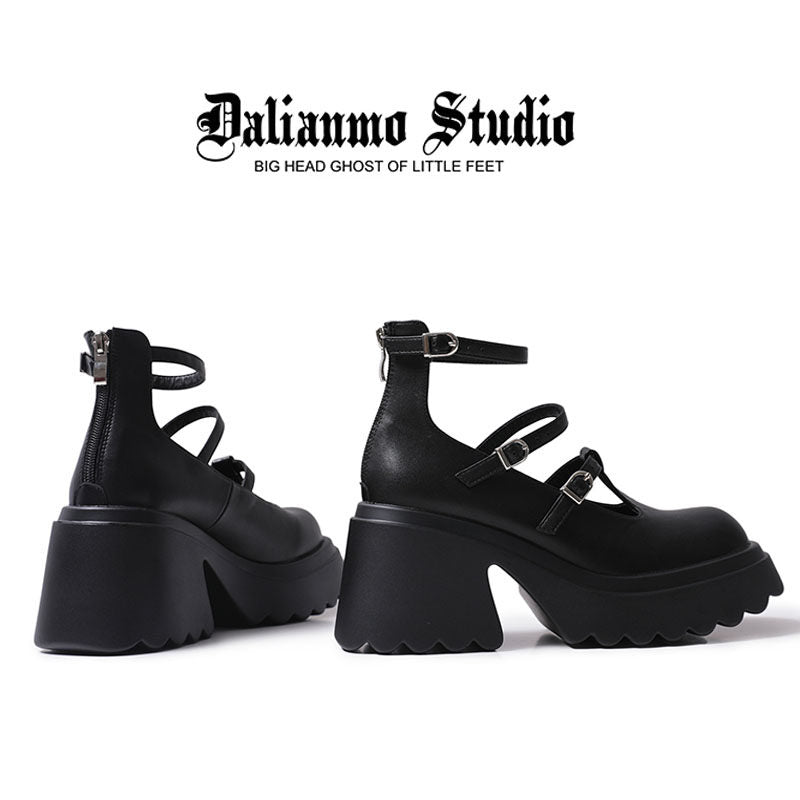 Black Mary Jane platform high heels, side view with ankle strap and buckles