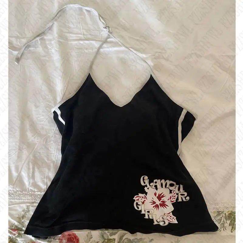 Black graphic tank top with red flower and lettering print