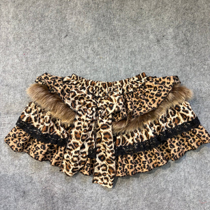 Leopard print puffy mini skirt with black lace trim, faux fur trim and tied bow