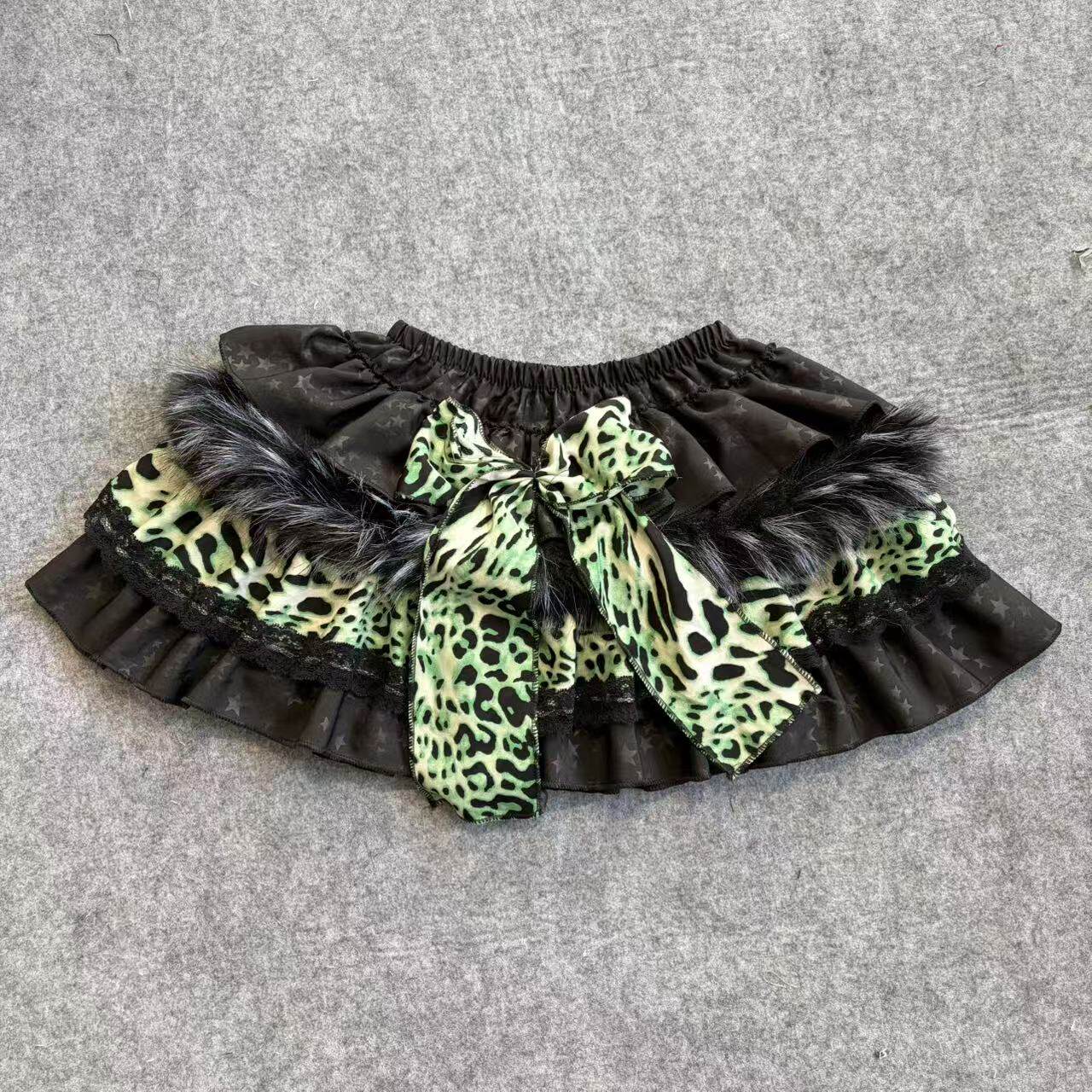 Lan Zong mini skirt, black with neon green leopard bow and layered ruffles