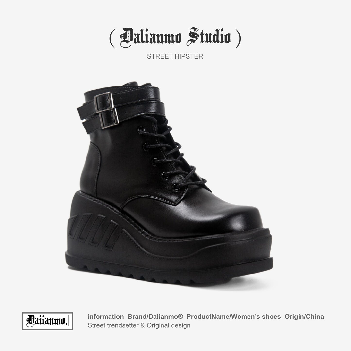 Black lace-up platform boots with top buckle strap and thick tread sole