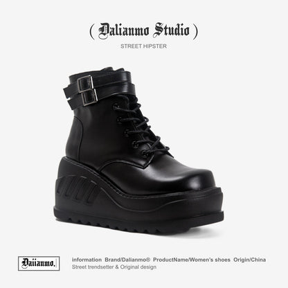 Black lace-up platform boots with top buckle strap and thick tread sole