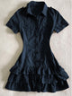 Dark blue button-front shirt dress with chest pockets and tiered ruffle hem