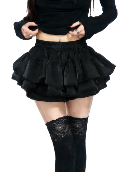 Black tiered ruffle skirt with gathered elastic waistband and layered fabric