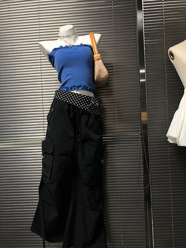 Black wide-leg pants with white polka-dot waistband band