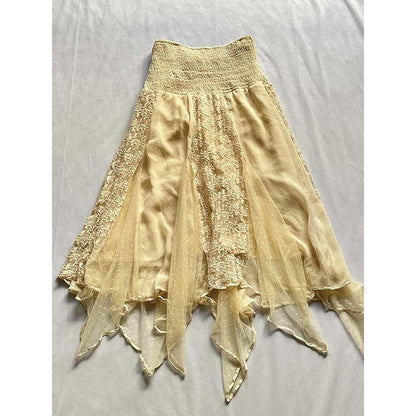 Yellow tulle skirt with lace trim, elastic waistband, and irregular swing hem