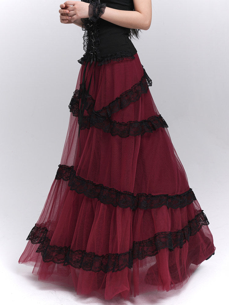 Burgundy tiered maxi skirt with black lace trim, ruffle tiers, and sheer tulle hem