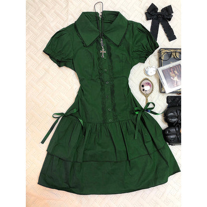 Green lace patchwork dress with puff sleeves, button placket, and waist ribbon ties.