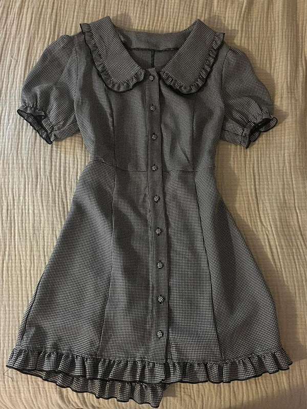 Plaid midi dress with doll collar, button front, short puff sleeves, and ruffled hem