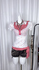 Pink flower print halterneck top with ruffled bib and button placket