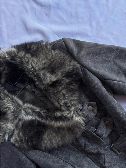 Gray motorcycle jacket close-up: textured faux leather, fur-trim shoulder yoke, snap tabs