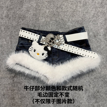 Denim shorts with white faux-fur trim and studded white belt featuring skull charm