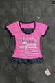 Pink T-shirt with black-trim neckline and polka-dot ruffle hem, heart letter graphic print