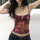 Burgundy floral cami top with spaghetti straps and fitted hem