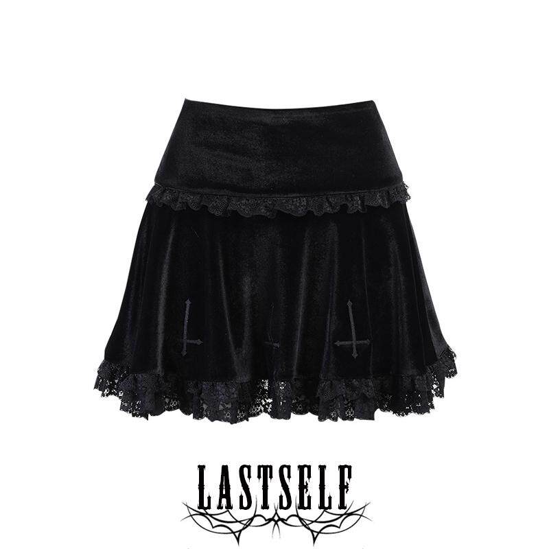 Black embroidered tiered skirt with ruffle hem and cross motifs