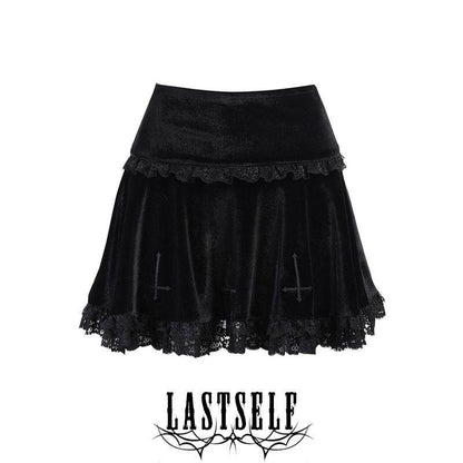 Black embroidered tiered skirt with ruffle hem and cross motifs