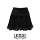 Black embroidered tiered skirt with ruffle hem and cross motifs