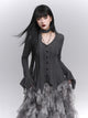 Black long-sleeve knit cardigan with button front and ruffled peplum hem