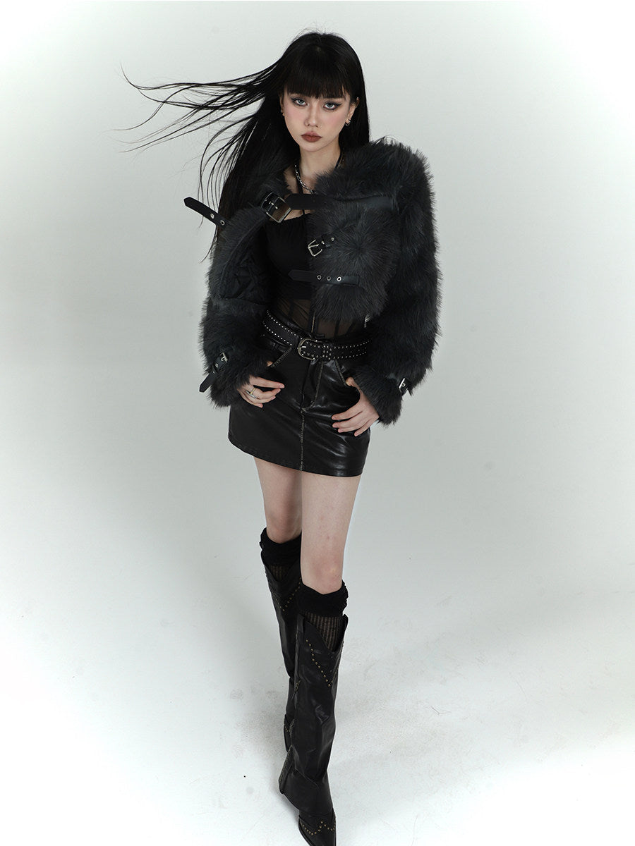 Black faux fur jacket with studded belt straps and long sleeves