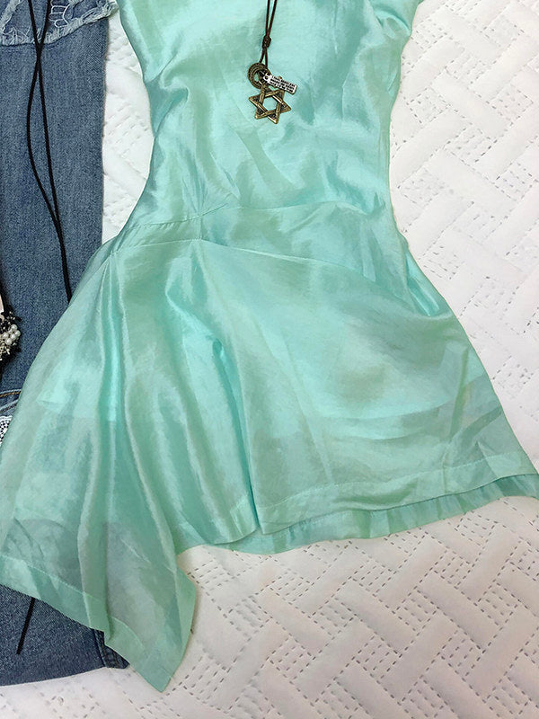 Mint green sleeveless mini dress with gathered waist and flared irregular hem