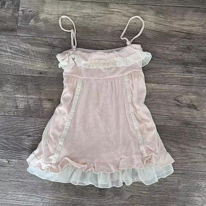 White ruffle-trim mesh dress with bow spaghetti straps and tiered skirt