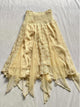 Yellow tulle skirt with elastic waistband, lace patchwork panels, and layered irregular hem