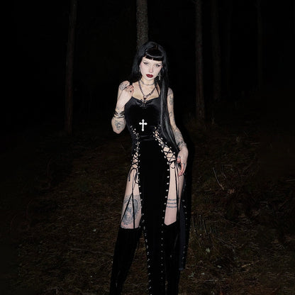 Black sleeveless cut-out dress with V-neck, cross detail, front studs, long fringe skirt