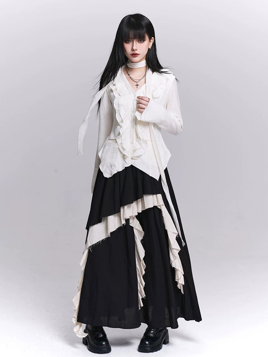 Black maxi skirt with irregular layered ruffles and white contrast panels