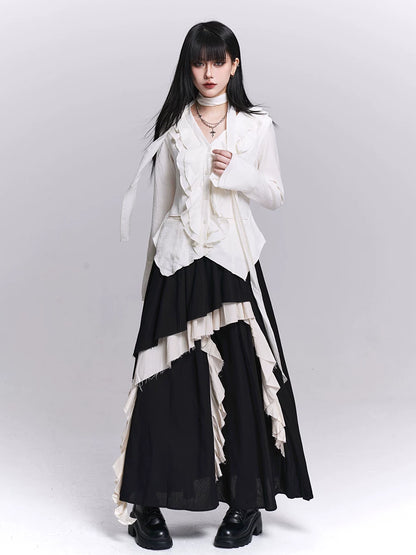 Black maxi skirt with irregular layered ruffles and white contrast panels