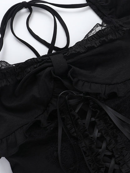 Black corset top close-up with lace-up ties, ruffled neckline, and lace-trim detailing