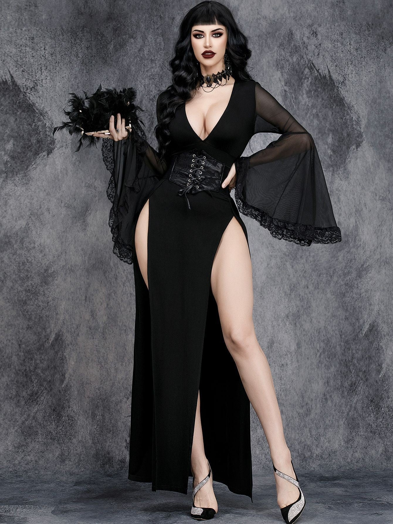 Black V-neck maxi dress with sheer sleeves, lace trim, and center front slit