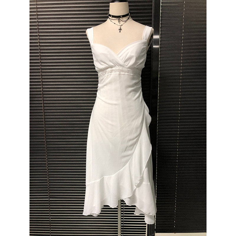 White chiffon camisole dress with V bodice, cinched waist seam, and flowing midi skirt